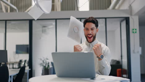 Businessman,-success-or-throwing-paper-in-laptop