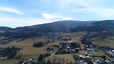 very close drone shot of a church on a mountain, flying backward, 4k uhd