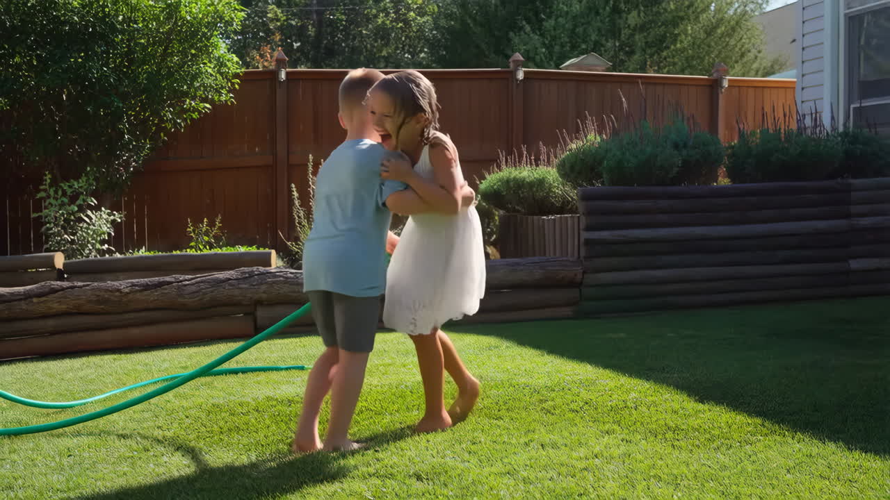 Children Playing with Water and Hugging in a Sunny Backyard