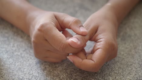 close-up of clasped hands