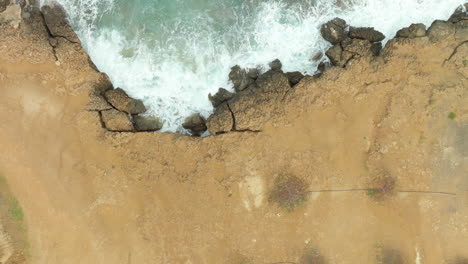 rocky coastline of a mediterranean sea in aerial downwards view