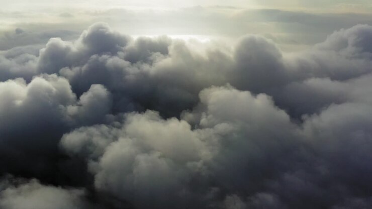 Clouds in atmosphere, above iconic landscape, aerial shot