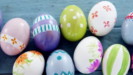 painted easter eggs on wooden surface