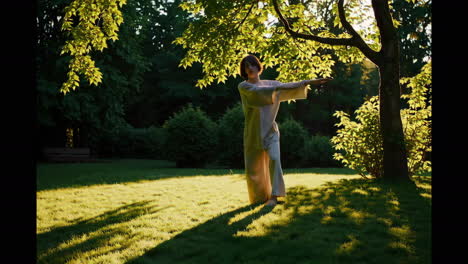 woman in a park at sunset
