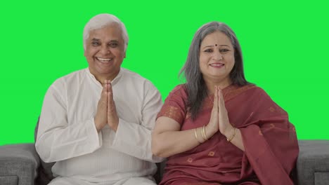 Happy-Old-Indian-couple-doing-Namaste-Green-screen