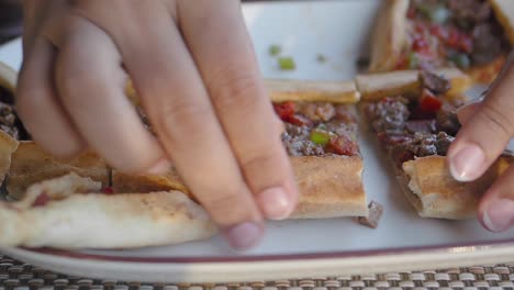 hands preparing a turkish pide