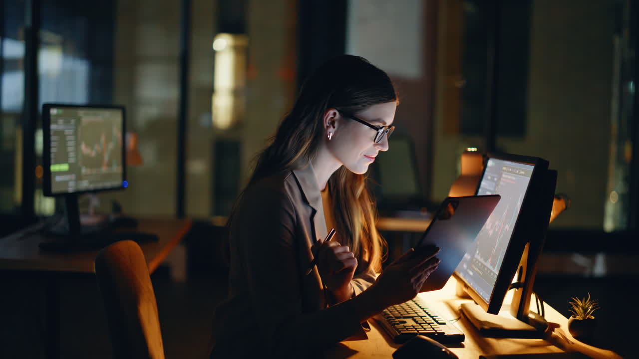 Nighttime investor analyzing blockchain using touchscreen in workspace closeup