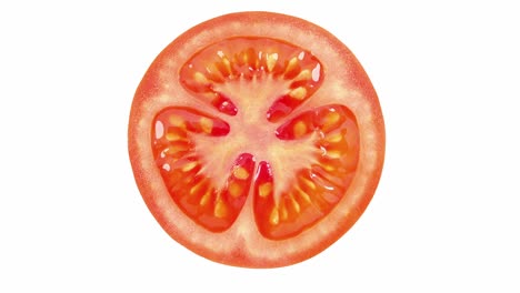 corte de tomate, primer plano medio, girando sobre un fondo blanco, vista desde arriba.