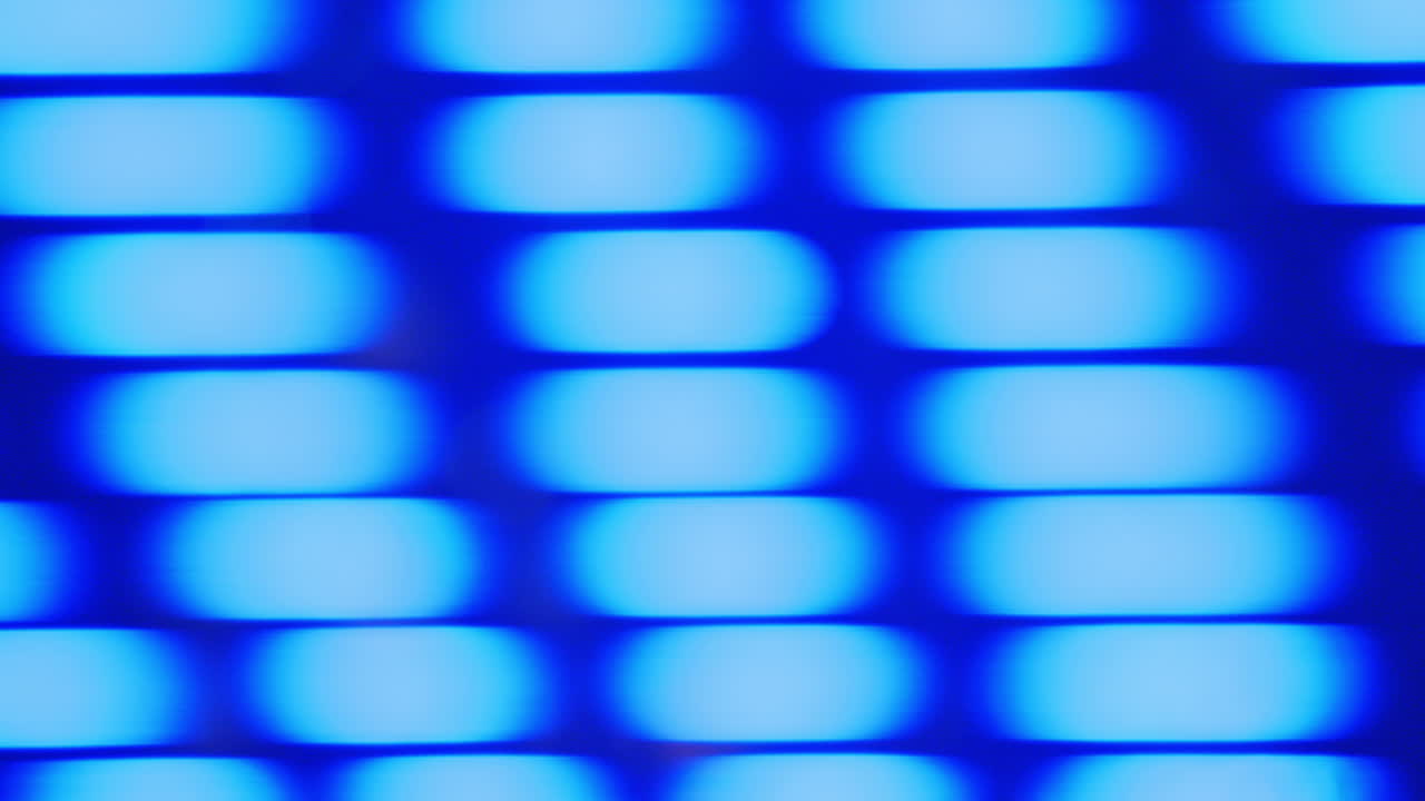 Griglia di luce blu dinamica con effetto bokeh mutevole.