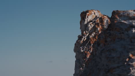 a close-up view of the rocky dolomite stone formations of the trollholmsund beach in norway