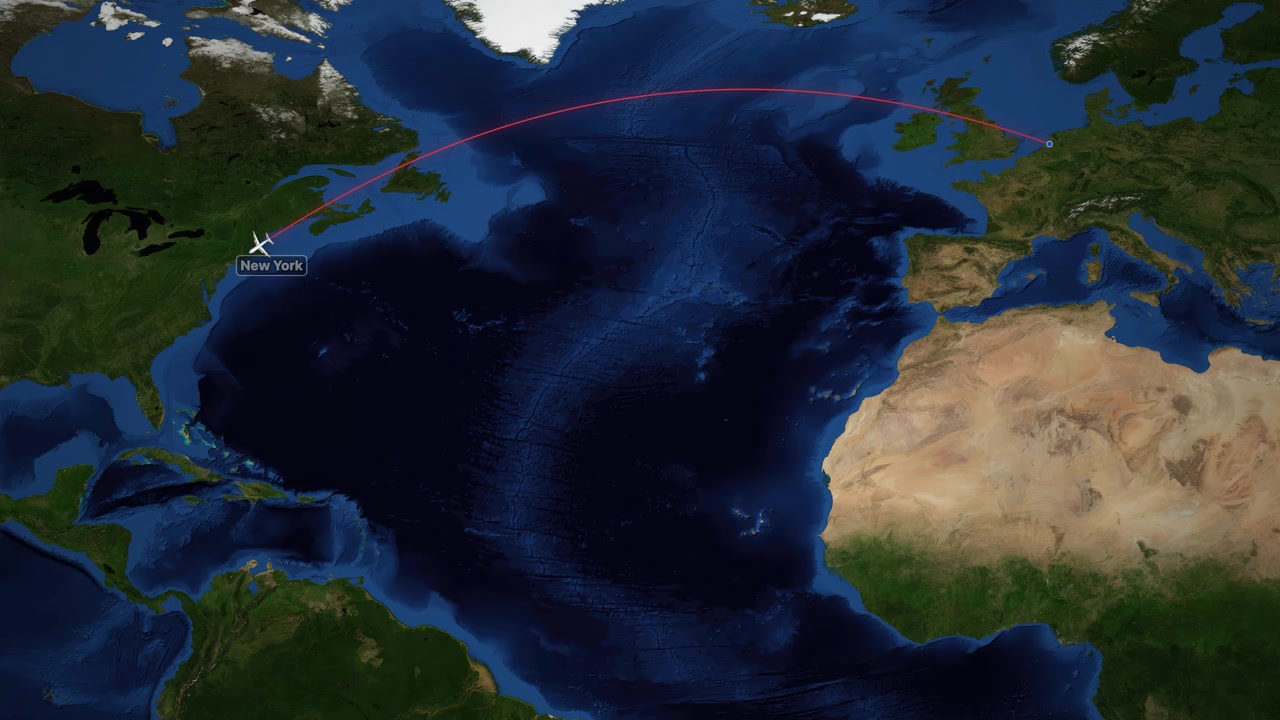 A digital world map tracks an airplane flying across the Atlantic Ocean toward North America