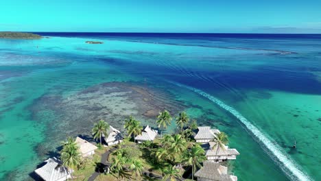 North-Coast-of-Moorea,-French-Polynesia---A-Sight-of-Untouched-Azure-Waters---Drone-Flying-Forward