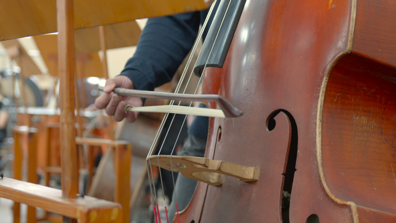 Close-up of a Cello Being Played