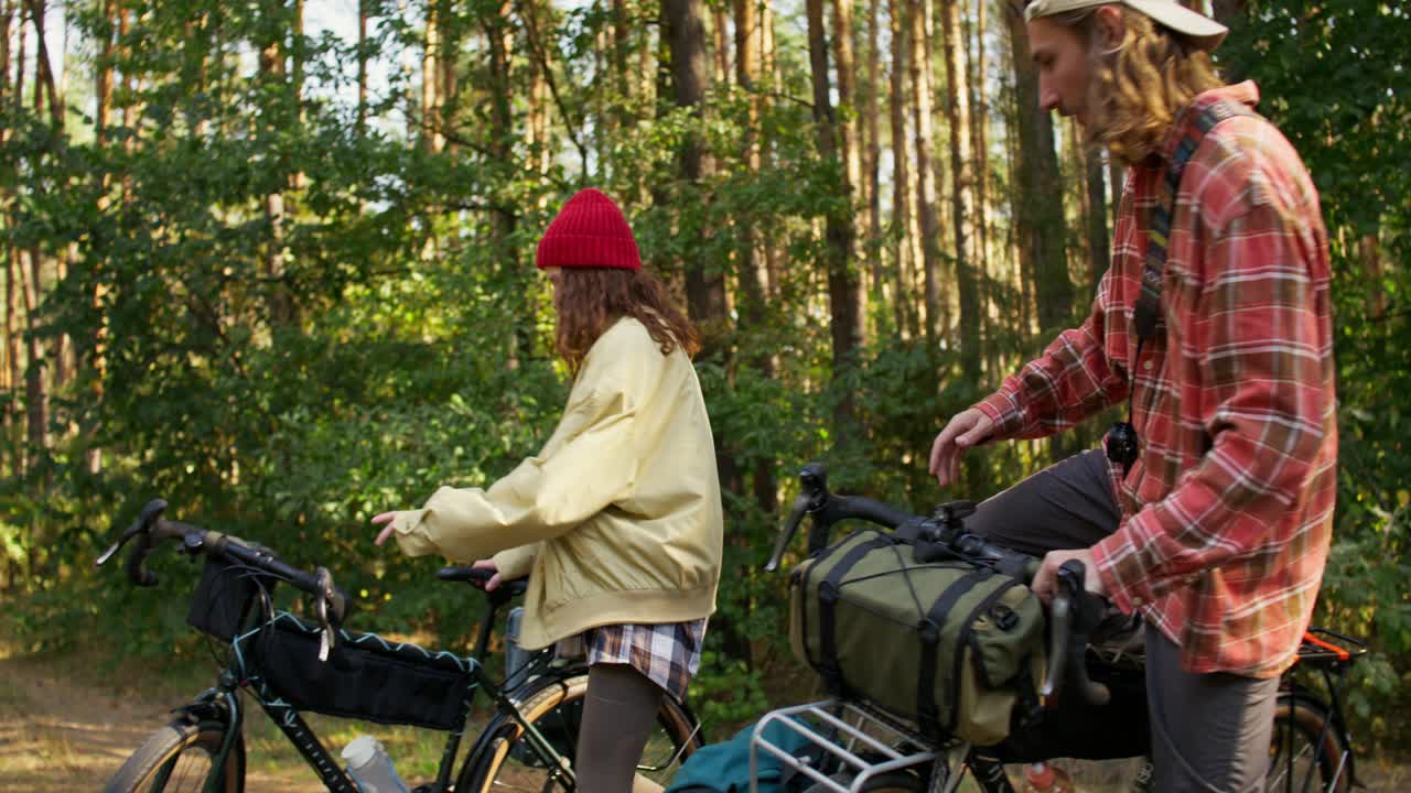 Couple Cycling in the Forest