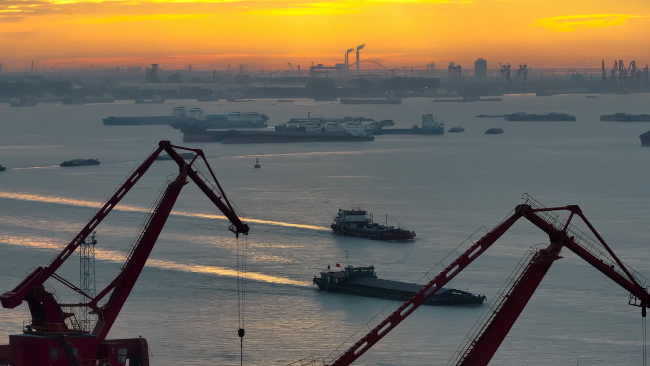 Sunset global logistics, international trade, maritime transportation hubs. container ship import export business commercial port in deep sea load and unloading cargo by crane for distributing goods