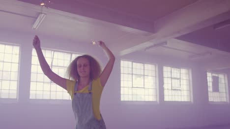 fashionable young woman in an abandoned warehouse