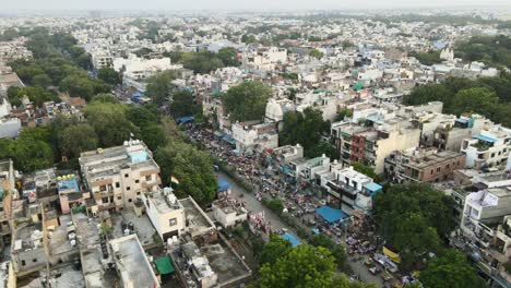 4k aerial shots of new delhi residential suburbs on a beautiful day gliding over rooftops, streets, parks and markets in india