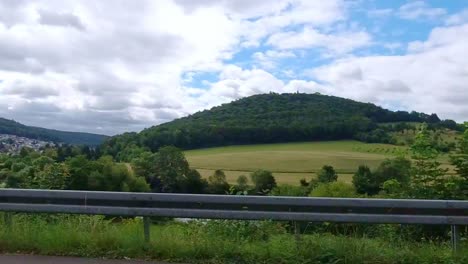 fast passing view of beautiful landscape during overcast summer day, neckarsteinach germany