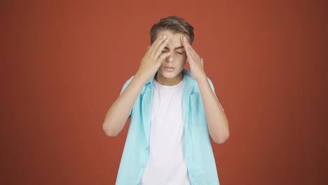 Boy-with-migraine-is-experiencing-pain.