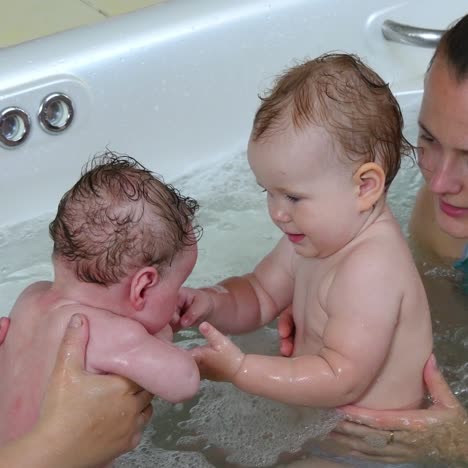 mother with her child in jacuzzi