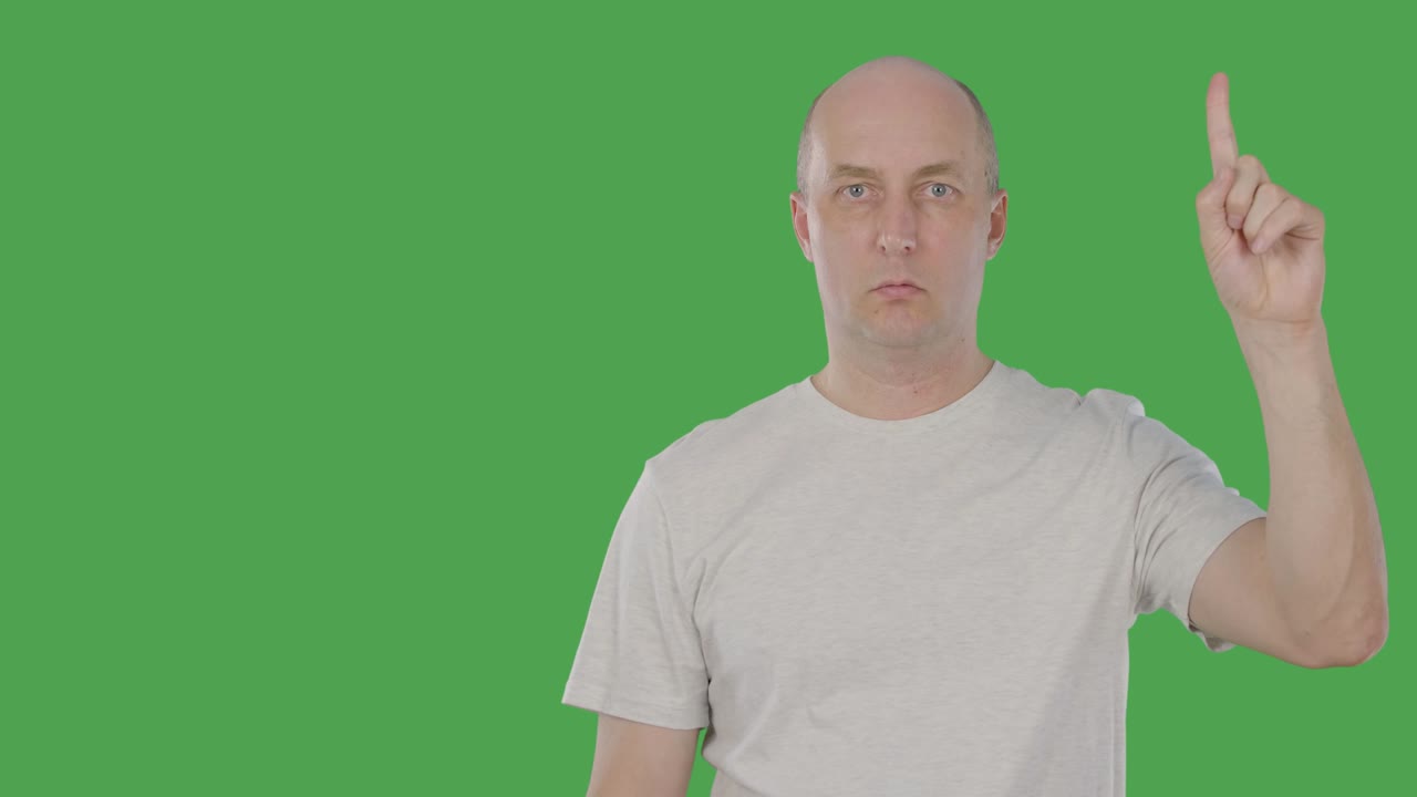 Bald man thinking and touching his chin with finger and inventing original idea. Alpha channel, keyed green screen