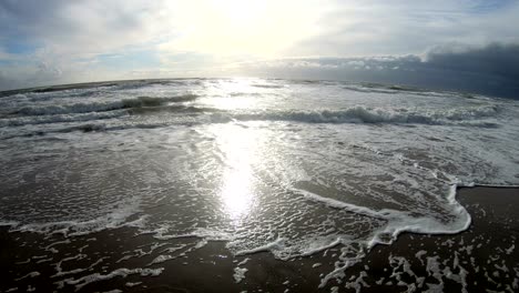 sandy beach with waves, north sea, jütland, sondervig, denmark, 4k