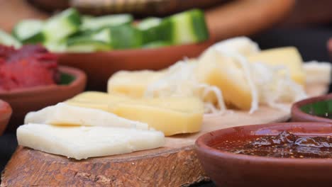 turkish breakfast with cheese, olives, and cucumbers