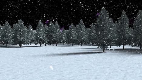 snow falling over multiple tress on winter landscape against purple light trails on black background