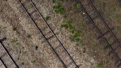 The-video-commences-with-a-cinematic-shot-capturing-the-rhythmic-clatter-of-steel-wheels-against-tracks