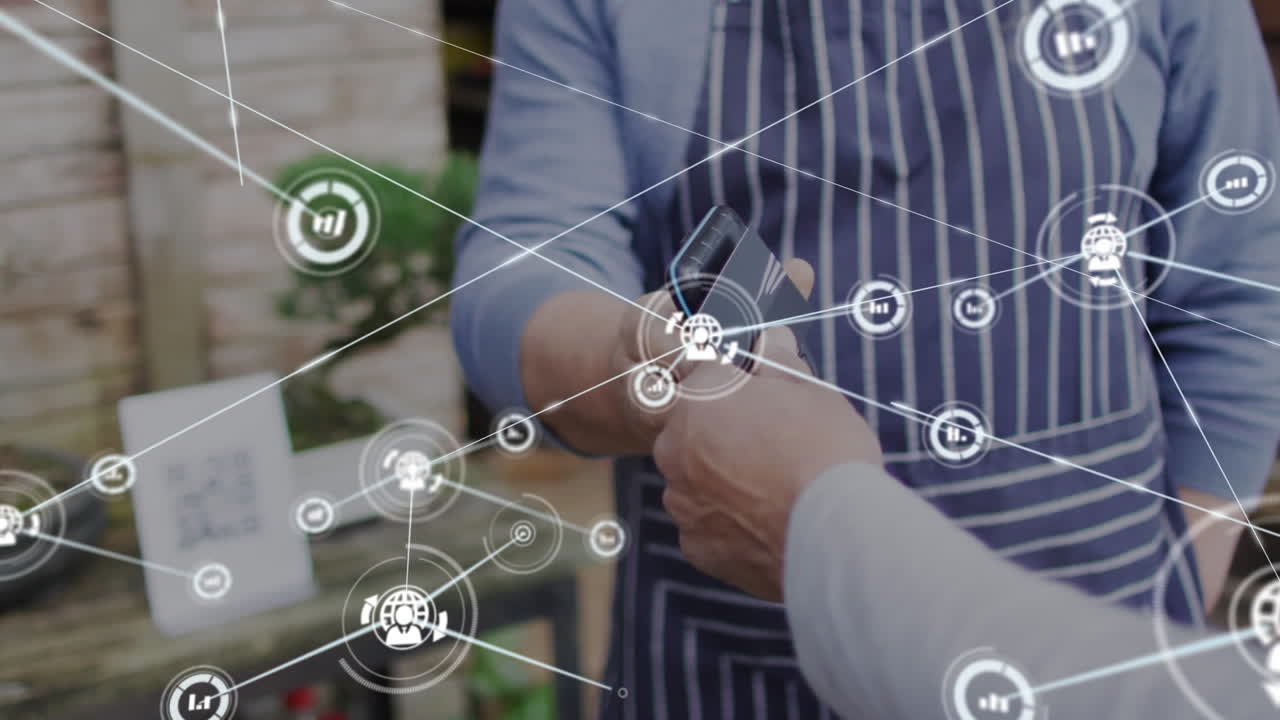 animación de iconos de los medios sobre un hombre caucásico pagando con tarjeta de crédito