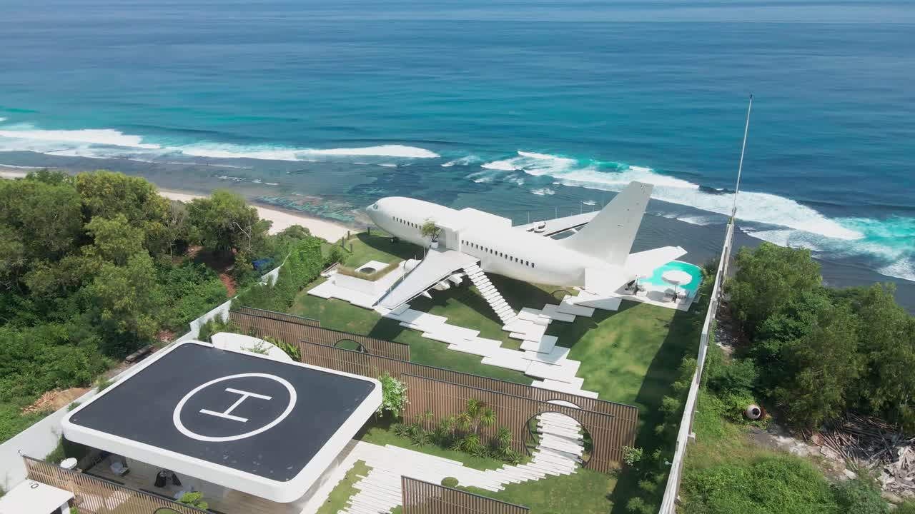 Bali’s first luxury Private Jet Villa on Uluwatu’s cliffs. This exclusive retreat offers stunning ocean views, lush surroundings, and is complete with a private helipad for ultimate access.