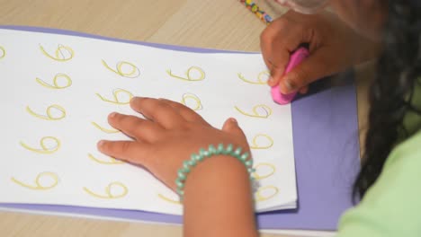 child practicing writing number 6