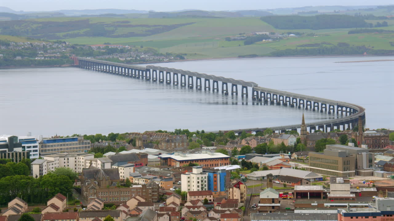 Wide shot of the Tay rail bridge over the river Tay at Dundee, taken from law hill