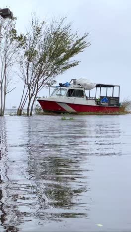 scuba diving boat in hurricane flood waters run aground from storm surge, wreck