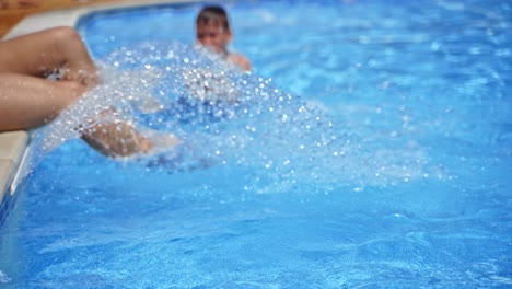 happy teen in swimming pool. kid having fun in swimming pool