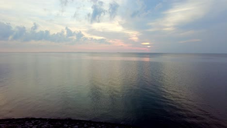 sunset at norderhafen (northern harbor) of the nordstrand peninsula at the wadden sea national park in schleswig-holstein, germany, europe
