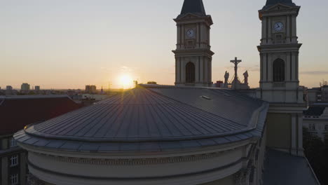 drone rising in front of the cathedral of the divine saviour, sunset in ostrava