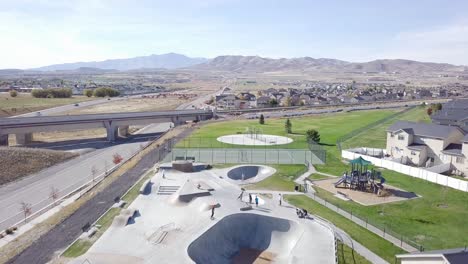 lehi skatepark in salt lake city utah on a sunny day - aerial descent