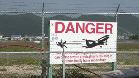 danger sign outside sxm airport