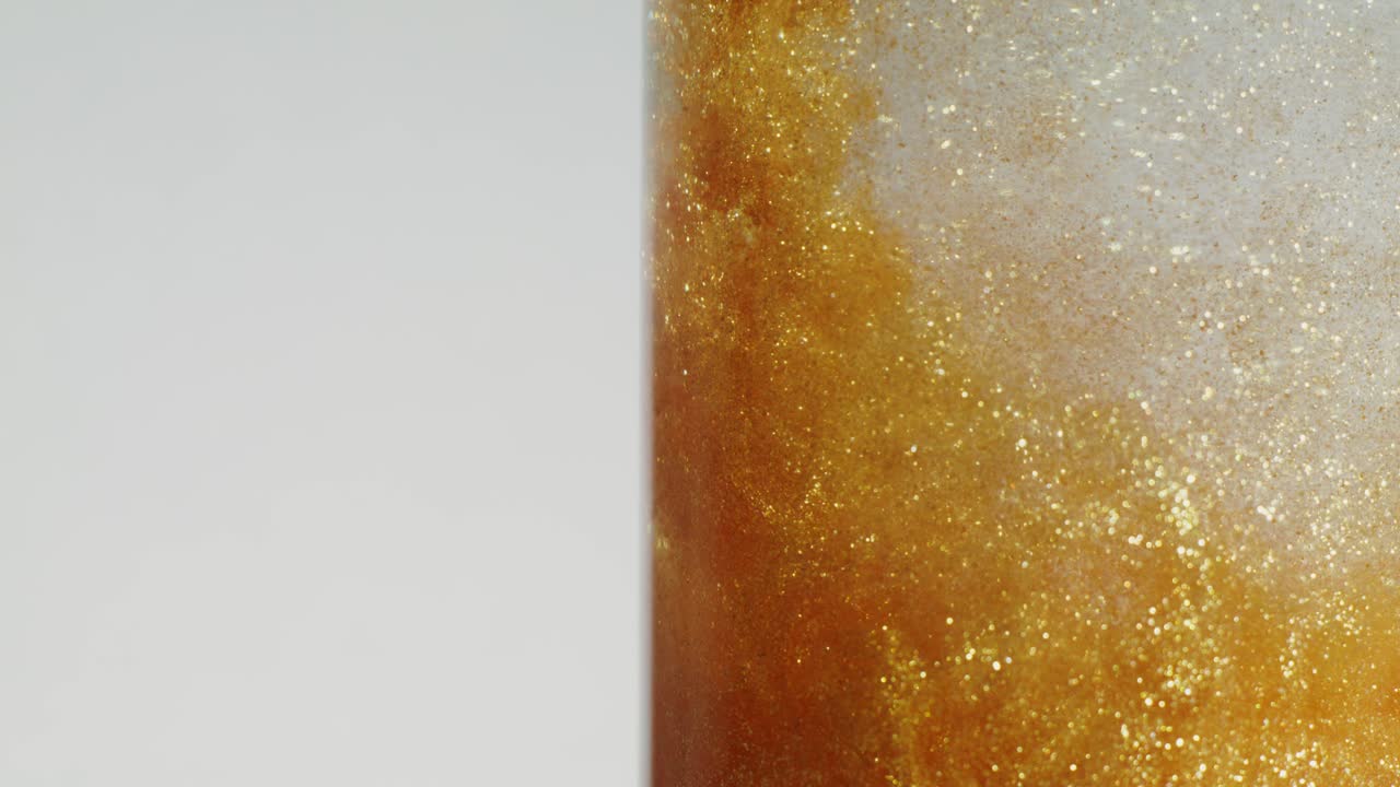 Golden Glitter Liquid Experiment