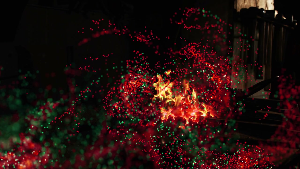 Converging particle cloud sparking flame, forming ribbons and emitting sparks to reveal support