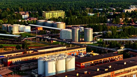 Industrial complex factory plant manufacture large storage tank Oil refinery, aerial drone