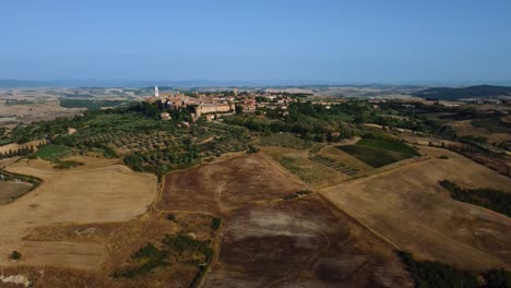 pienza in the heart of val d' orcia is a beautiful old village near siena in tuscany, italy, a masterpiece of mediterranean traditional architecture in the idyllic landscape with hills