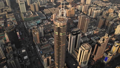 aerial circle shot of huge skyscraper building in shenzhen china metropolis