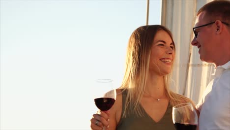 couple enjoying wine on a sailboat