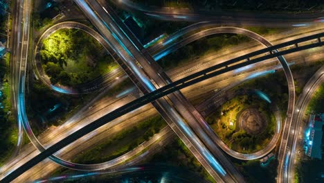 4k time lapse or hyper lapse : aerial view network or intersection of highway road for transportation or distribution concept background.