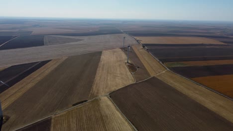 Wind-turbines-on-wind-park-scattered-across-farmland