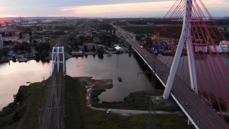 aerial dolly shot of cable-stayed bridge on motława river in gdansk, poland