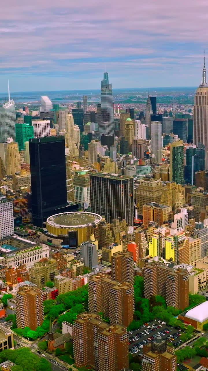 New York, Manhattan panorama at daytime. Beautiful city landscape with diverse buildings. Vertical video