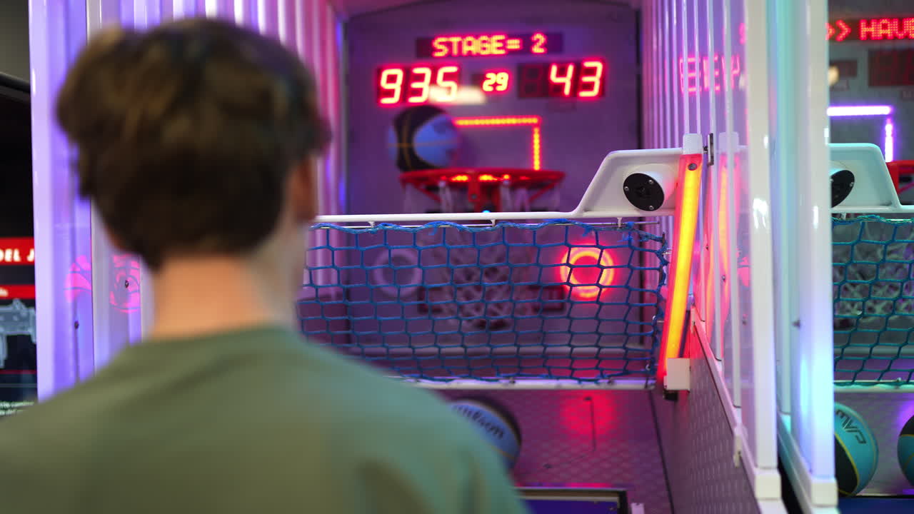 Playing basketball arcade game